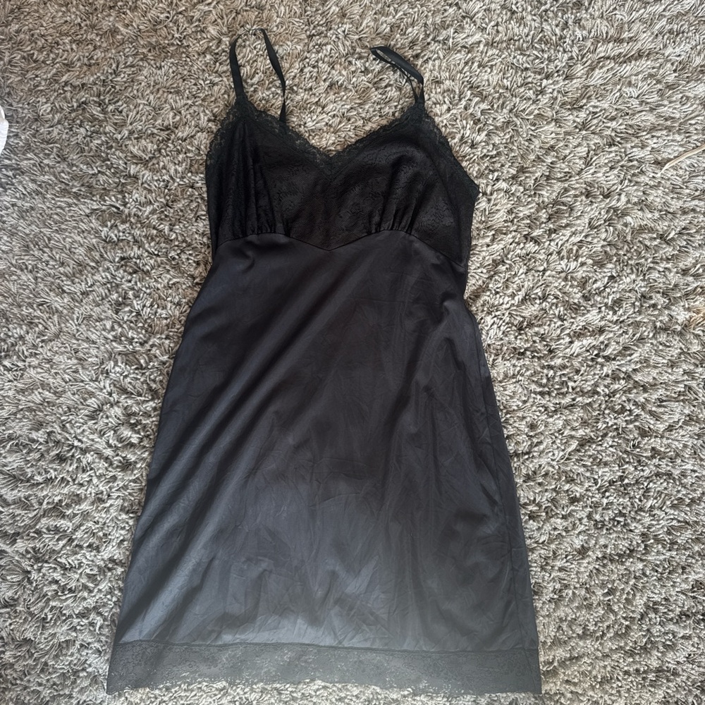 Vintage black lace midi slip dress 
Bought from vintage store so brand unknown